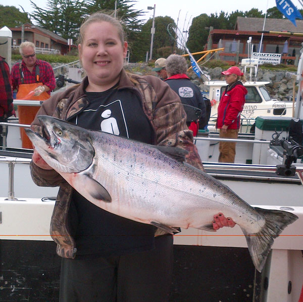 youth girl holding salmon